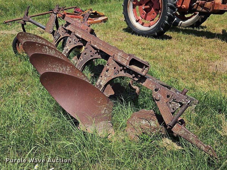 image for item DQ1762 McCormick  four bottom plow