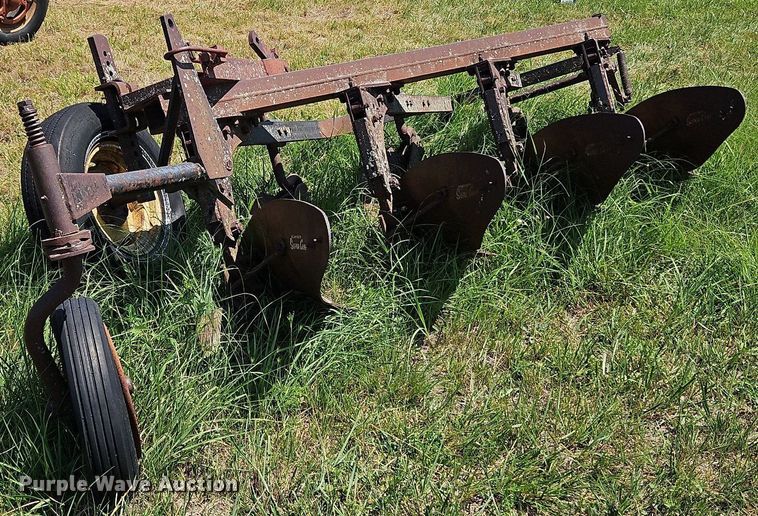 image for item DQ1762 McCormick  four bottom plow