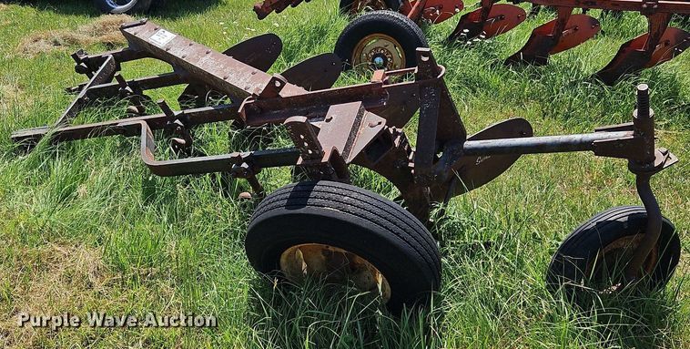 image for item DQ1762 McCormick  four bottom plow