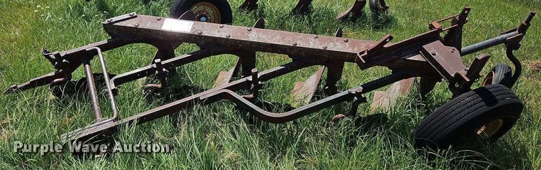 image for item DQ1762 McCormick  four bottom plow