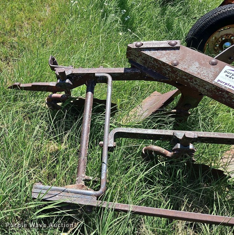 image for item DQ1762 McCormick  four bottom plow