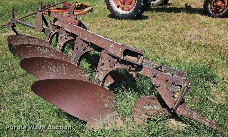image for item DQ1762 McCormick  four bottom plow