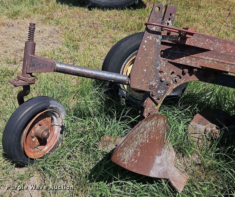 image for item DQ1762 McCormick  four bottom plow