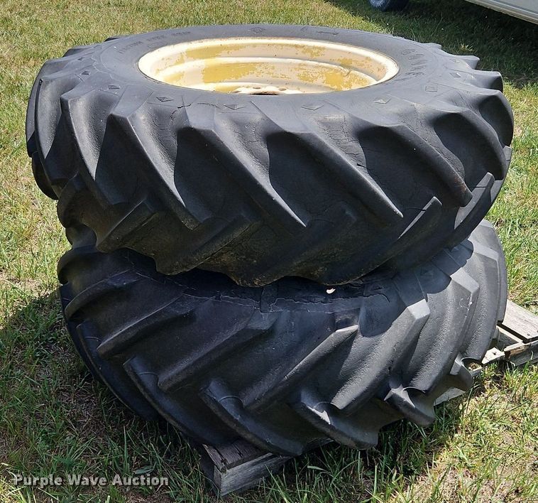 image for item DQ1776 (2) Goodyear 16.9-26 tires and wheels