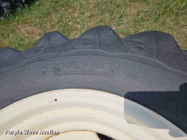 image for item DQ1776 (2) Goodyear 16.9-26 tires and wheels