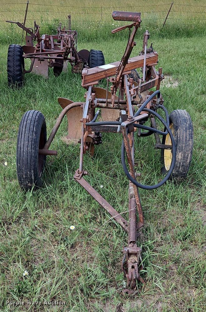 image for item DQ1781 McCormick  three bottom plow