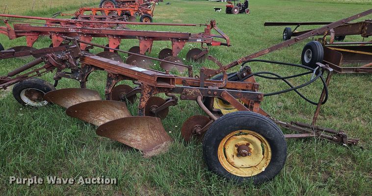 image for item DQ1781 McCormick  three bottom plow