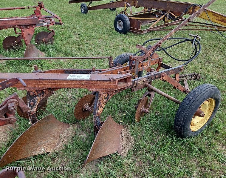 image for item DQ1781 McCormick  three bottom plow