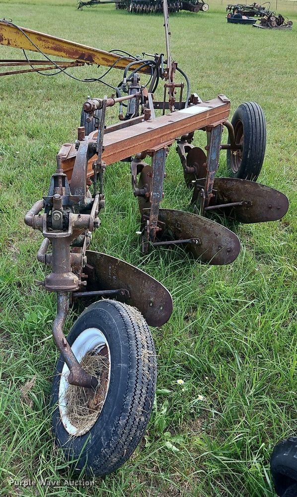 image for item DQ1781 McCormick  three bottom plow