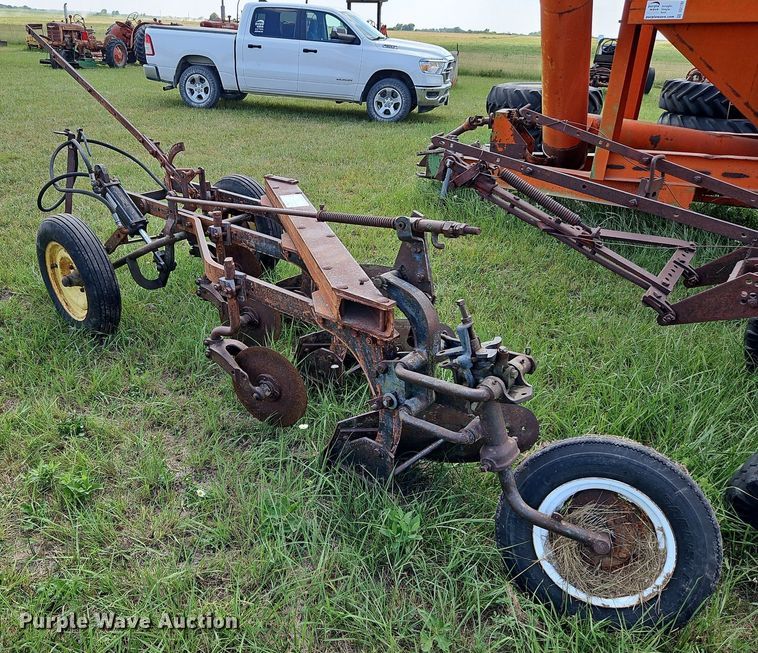 image for item DQ1781 McCormick  three bottom plow