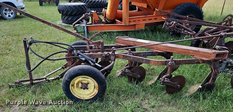 image for item DQ1781 McCormick  three bottom plow
