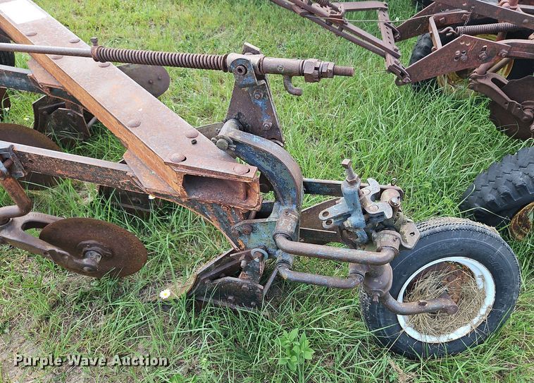 image for item DQ1781 McCormick  three bottom plow