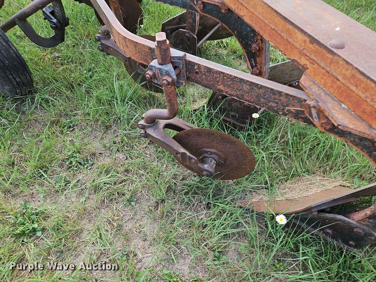 image for item DQ1781 McCormick  three bottom plow