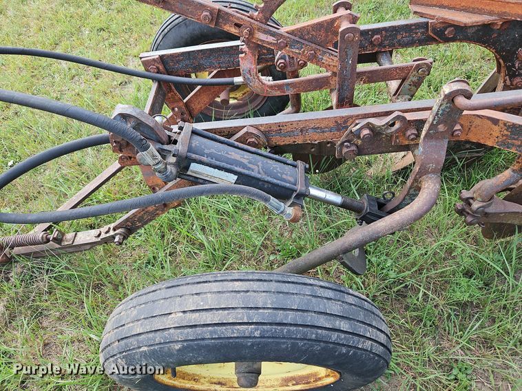 image for item DQ1781 McCormick  three bottom plow