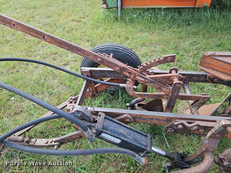 image for item DQ1781 McCormick  three bottom plow