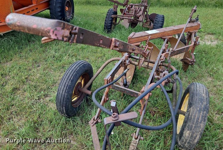 image for item DQ1781 McCormick  three bottom plow