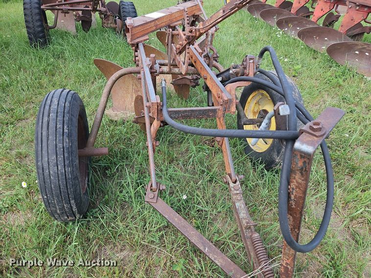 image for item DQ1781 McCormick  three bottom plow
