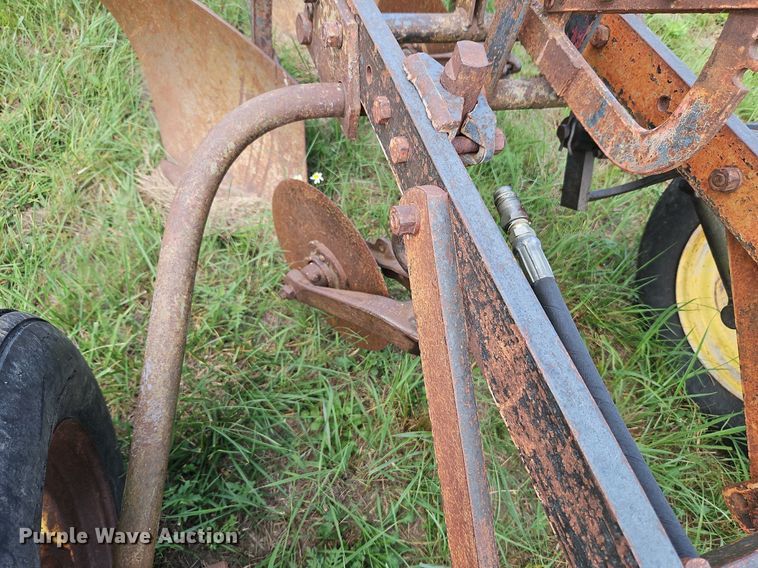 image for item DQ1781 McCormick  three bottom plow