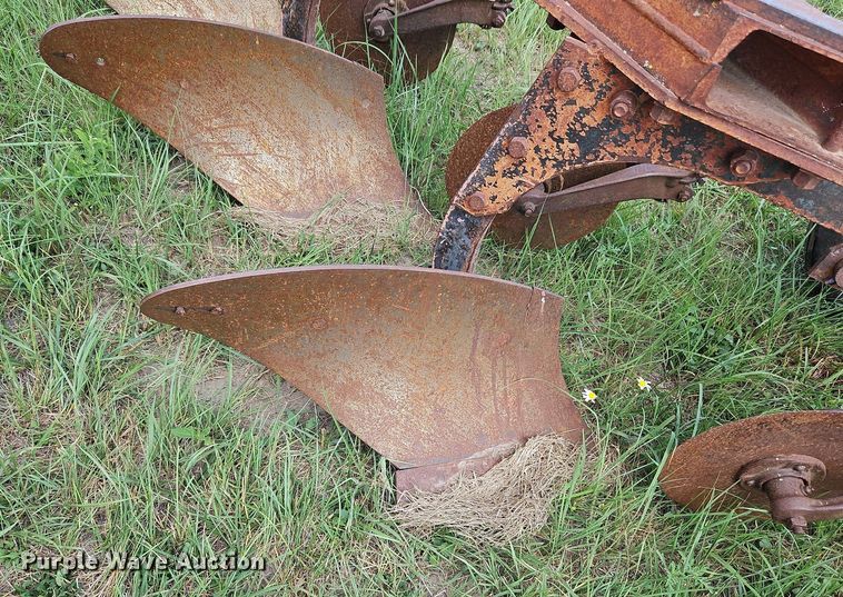image for item DQ1781 McCormick  three bottom plow
