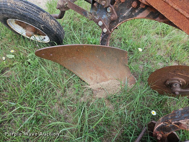 image for item DQ1781 McCormick  three bottom plow