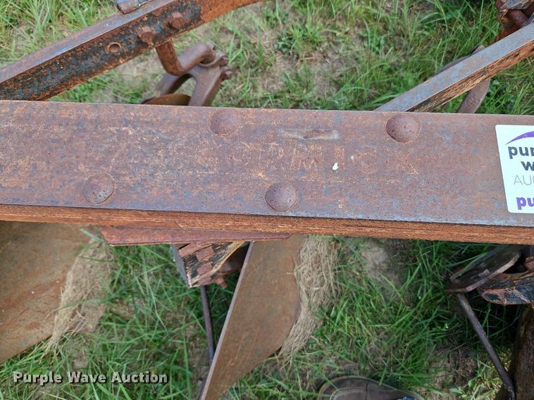 image for item DQ1781 McCormick  three bottom plow