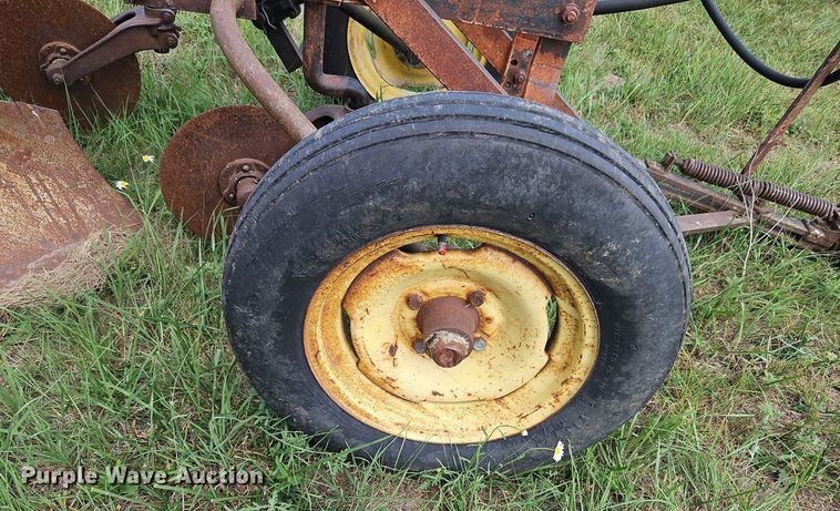 image for item DQ1781 McCormick  three bottom plow