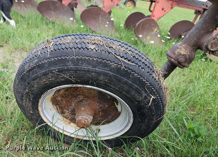 image for item DQ1781 McCormick  three bottom plow