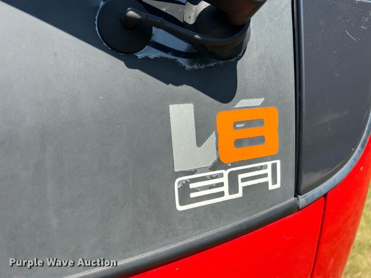 image for item DO2189 2005 Isuzu NPR  flatbed truck