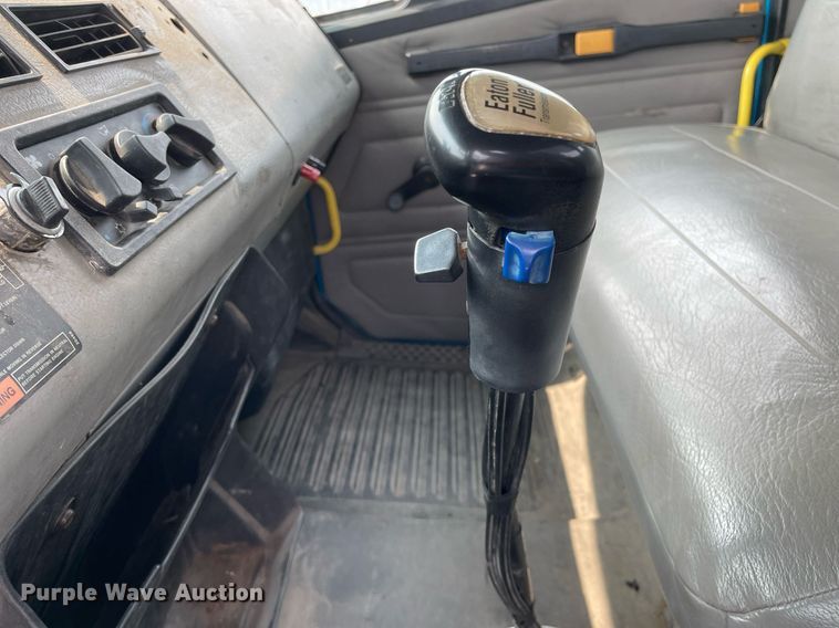 image for item LJ9772 2004 Freightliner FL80  flatbed truck