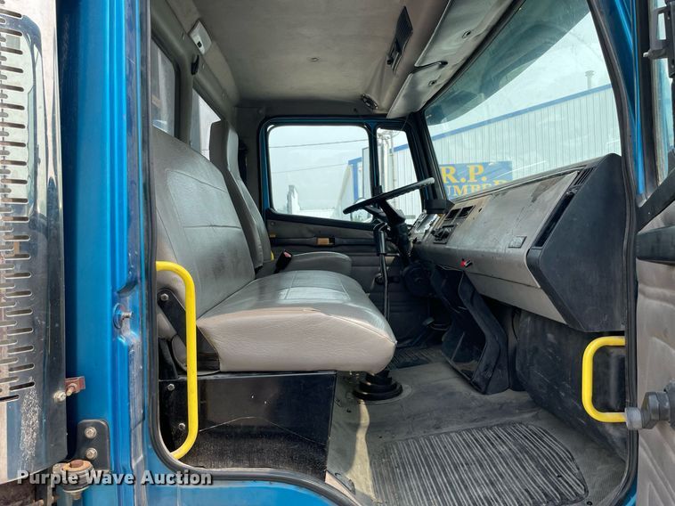 image for item LJ9772 2004 Freightliner FL80  flatbed truck