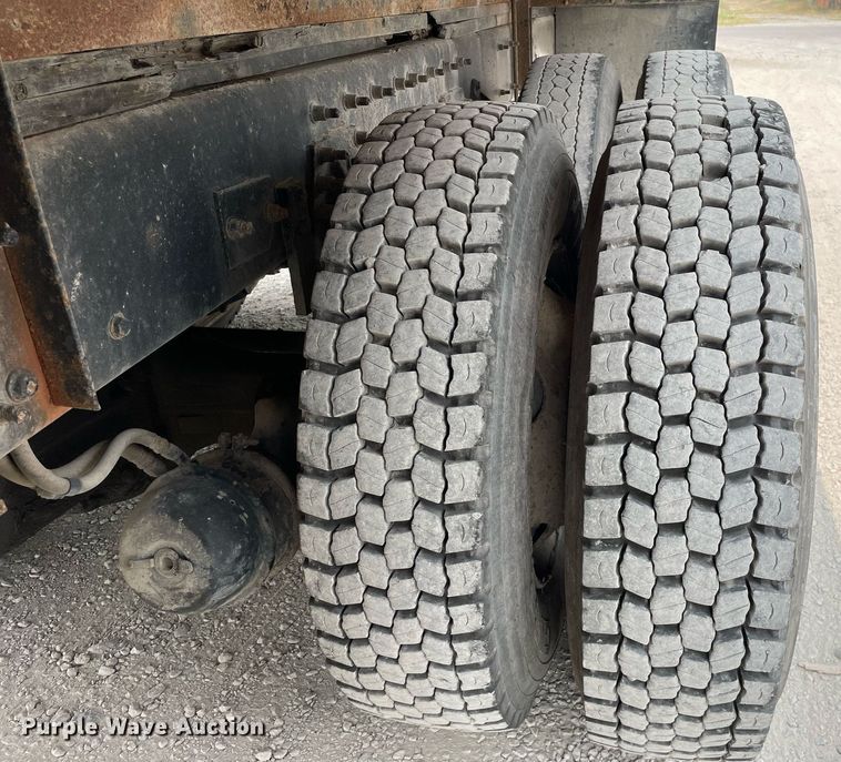 image for item LJ9772 2004 Freightliner FL80  flatbed truck