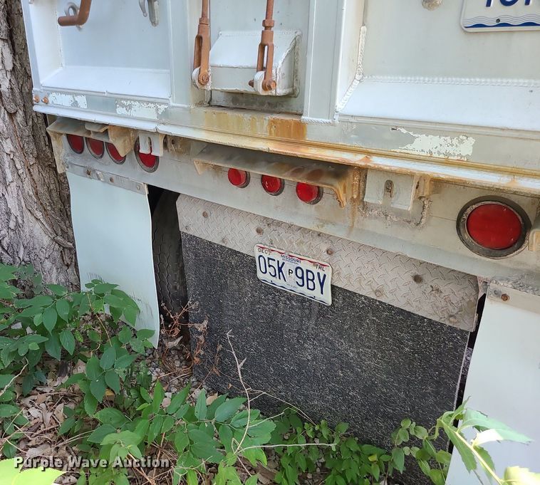 image for item MO9902 2001 MAC  end dump trailer