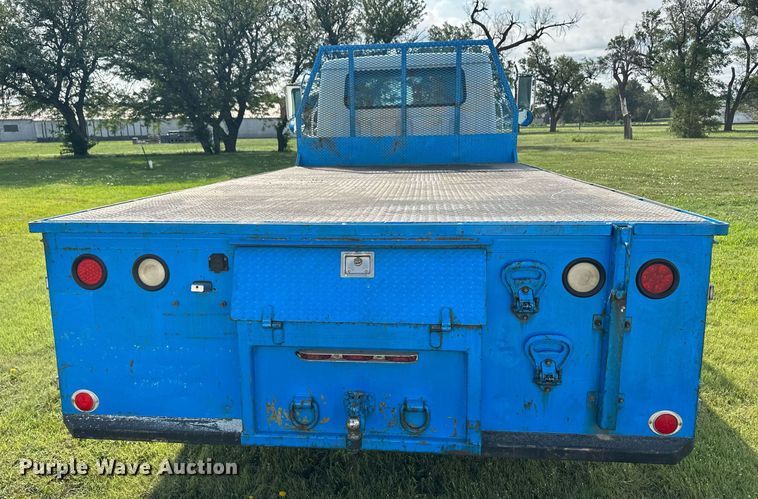 image for item NE9019 1996 International 4700  flatbed truck