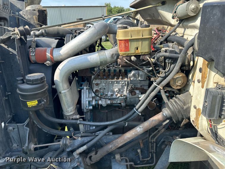 image for item NE9019 1996 International 4700  flatbed truck