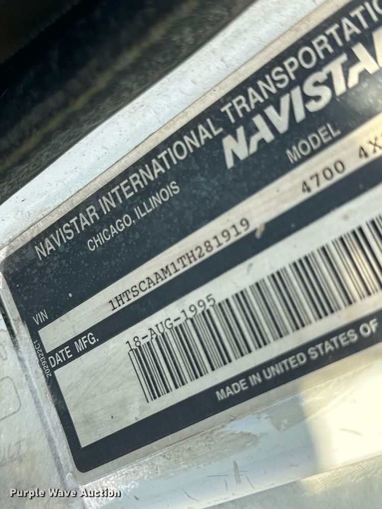 image for item NE9019 1996 International 4700  flatbed truck