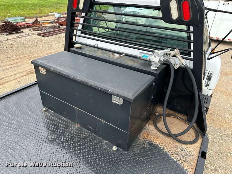 image for item OC9066 1998 GMC C7500  flatbed truck