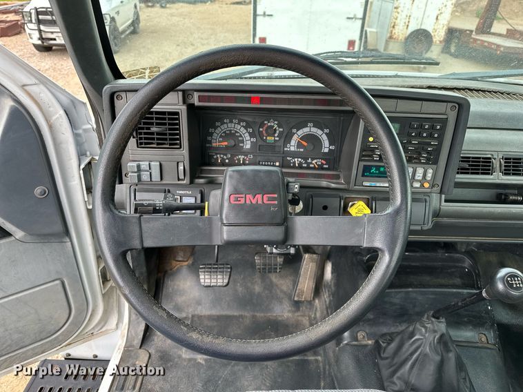 image for item OC9066 1998 GMC C7500  flatbed truck
