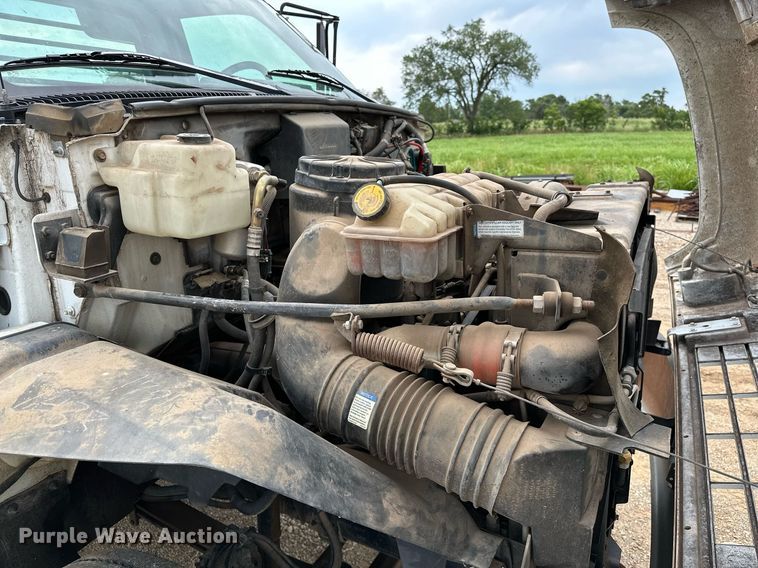 image for item OC9066 1998 GMC C7500  flatbed truck