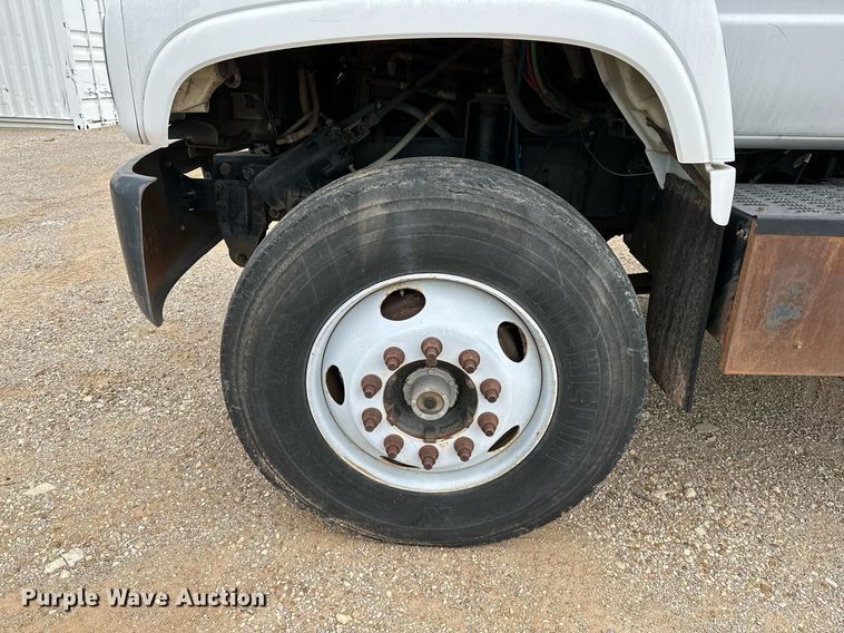 image for item OC9066 1998 GMC C7500  flatbed truck