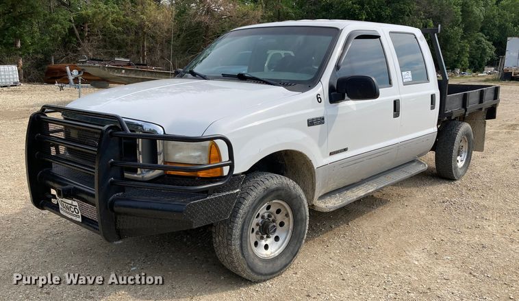 image for item DJ6182 2000 Ford F250 Super Duty XLT  Crew Cab flatbed pickup truck