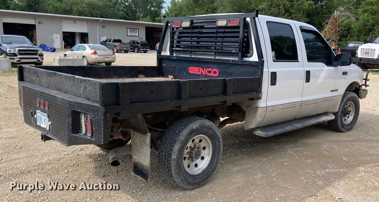 image for item DJ6182 2000 Ford F250 Super Duty XLT  Crew Cab flatbed pickup truck