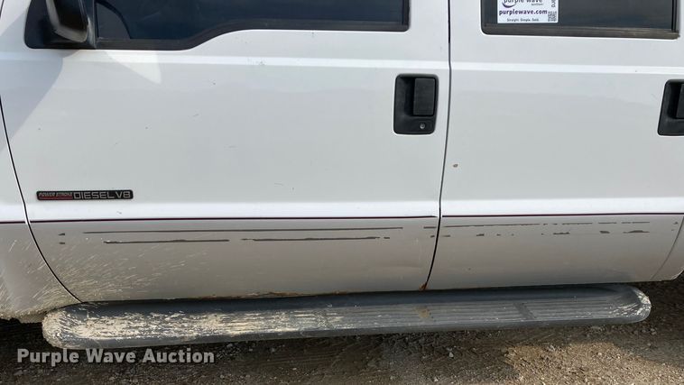 image for item DJ6182 2000 Ford F250 Super Duty XLT  Crew Cab flatbed pickup truck