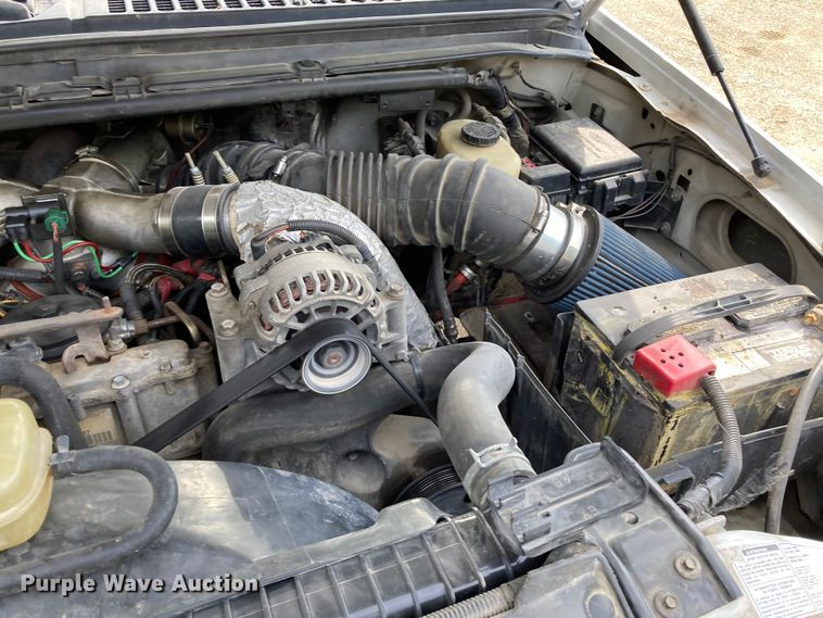 image for item DJ6182 2000 Ford F250 Super Duty XLT  Crew Cab flatbed pickup truck