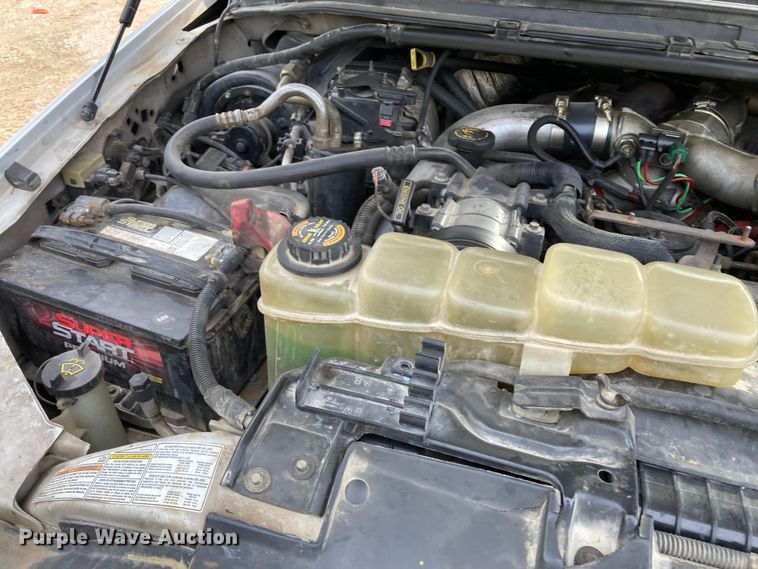 image for item DJ6182 2000 Ford F250 Super Duty XLT  Crew Cab flatbed pickup truck