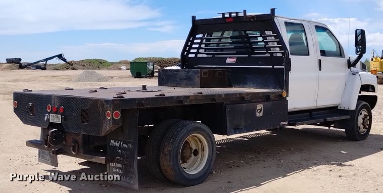 image for item DP3273 2009 GMC C5500  Crew Cab flatbed truck