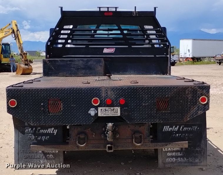 image for item DP3273 2009 GMC C5500  Crew Cab flatbed truck