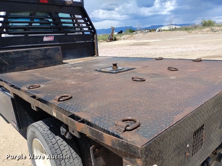 image for item DP3273 2009 GMC C5500  Crew Cab flatbed truck