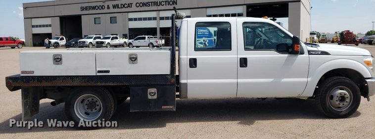 image for item IP9378 2016 Ford F350 Super Duty  Crew Cab flatbed pickup truck