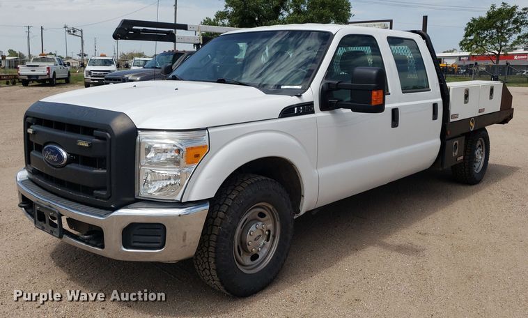 image for item IP9381 2016 Ford F250 Super Duty  Crew Cab flatbed pickup truck