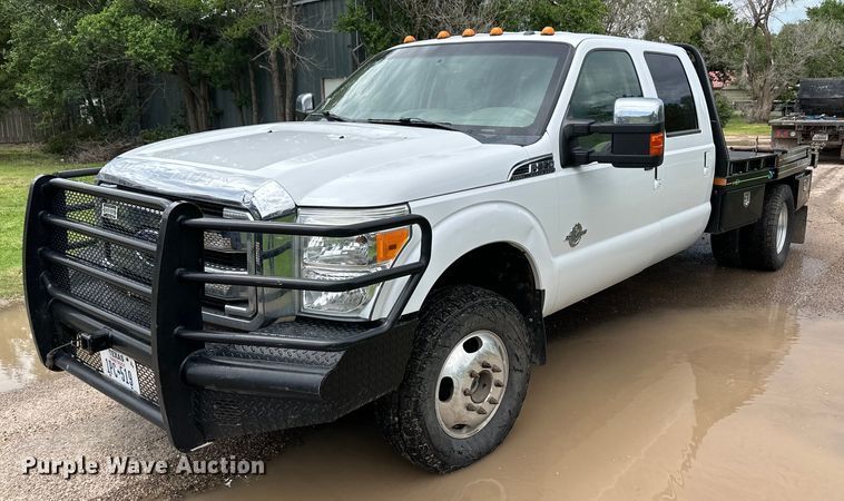 image for item KF9698 2015 Ford F350 Super Duty  Crew Cab bale bed pickup truck